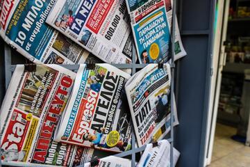 Closeup of Greek newspapers sold in the streets of Athens © Jose HERNANDEZ Camera 51/Shutterstock Closeup of Greek newspapers sold in the streets of Athens © Jose HERNANDEZ Camera 51/Shutterstock