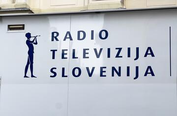 Truck from "Radio Televizija Slovenija" parked in front of University of Ljubljana. Credits: Adrian Tusar, Shutterstock.